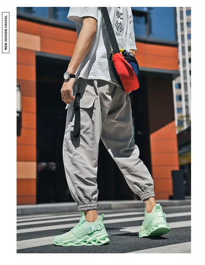 Hot Sale Fashion Purple Casual Sneakers Women Men Blade Running Shoes Big Size 48 Light Breathable Sports Shoes Men Mesh Sneaker