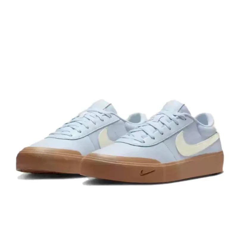Nike Court Shot: Bekväma, mångsidiga låga sneakers för män med tunn sula, halkskydd och slitstark, blå IB2316-400