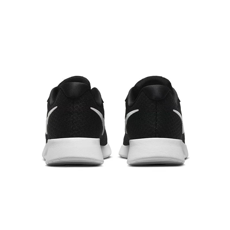 Nike Tanjun : chaussures de course basses pour homme et femme, confortables, polyvalentes, respirantes et résistantes - Noir DV7786-001